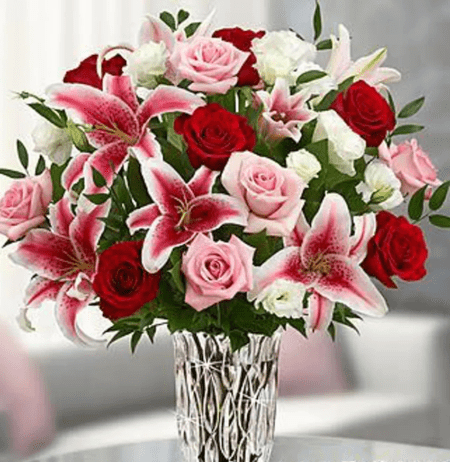 Send a gift that showers them in luxury! Our lush, handcrafted bouquet of long-stem red roses and Stargazer lilies, lisianthus and more. We can’t imagine a more perfect expression for someone special. 